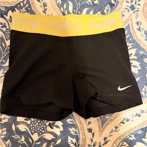 Nike Black Shorts with Yellow Band